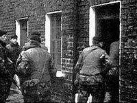 Image of soldiers entering a Catholic house in search of republicans