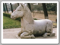Stone monuments along long walkway