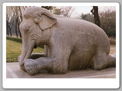 Stone monuments along long walkway