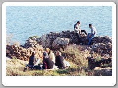 Family having a picnic across the street from the museum