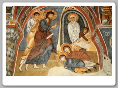 Frescoes on the walls of a large church carved in the soft stone