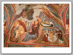 Frescoes on the walls of a large church carved in the soft stone