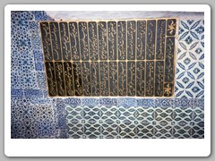 Wall engraving surrounded by tiles